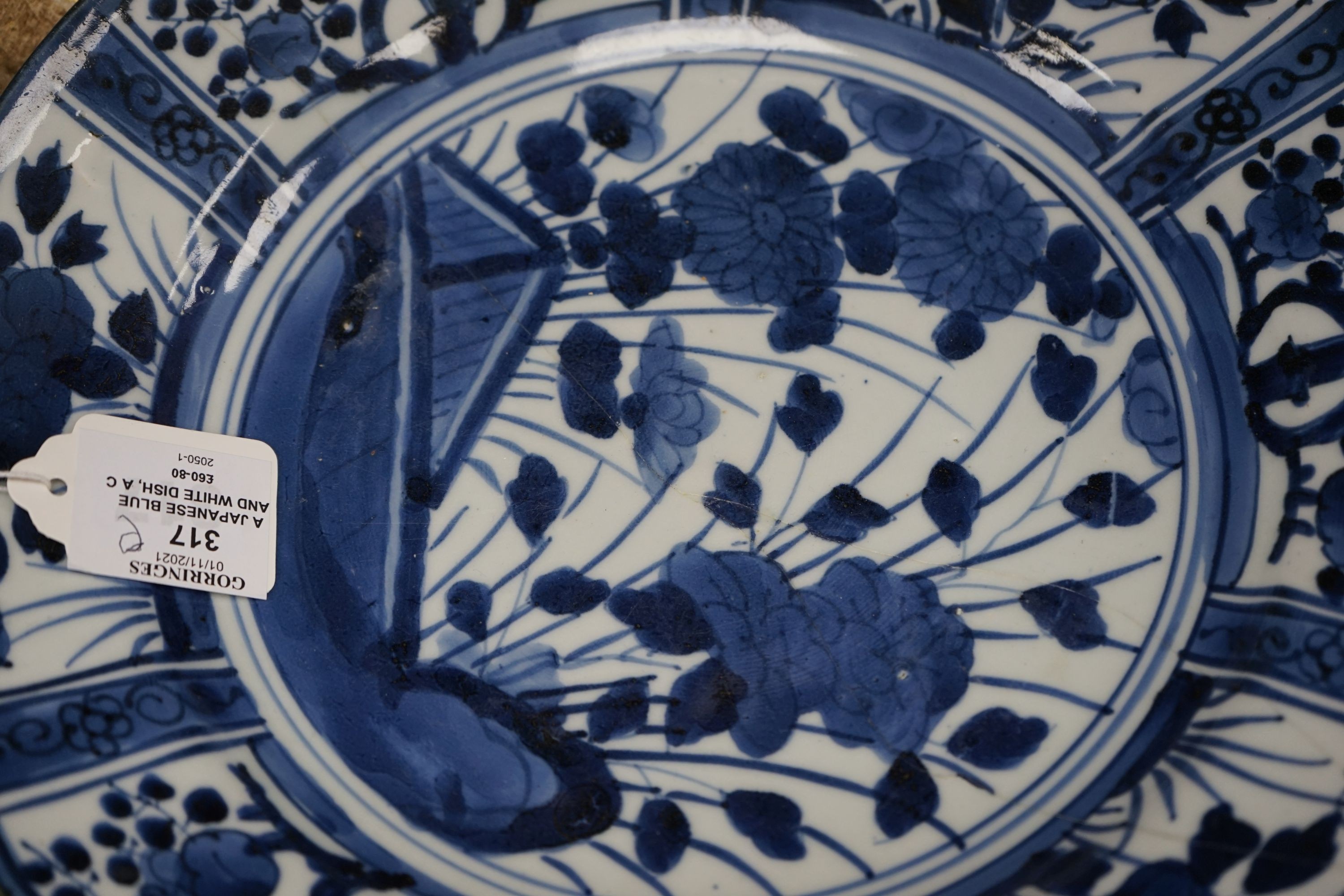 A Japanese blue and white dish, a Chinese blue and white meiping and a clobbered plate 33cm